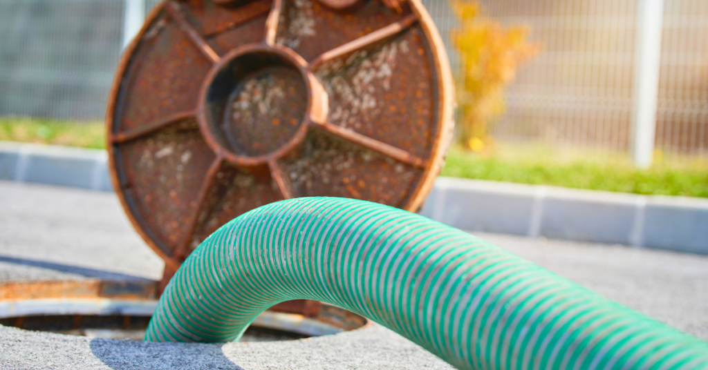 open storage tank lid with gamgajet cleaning hose